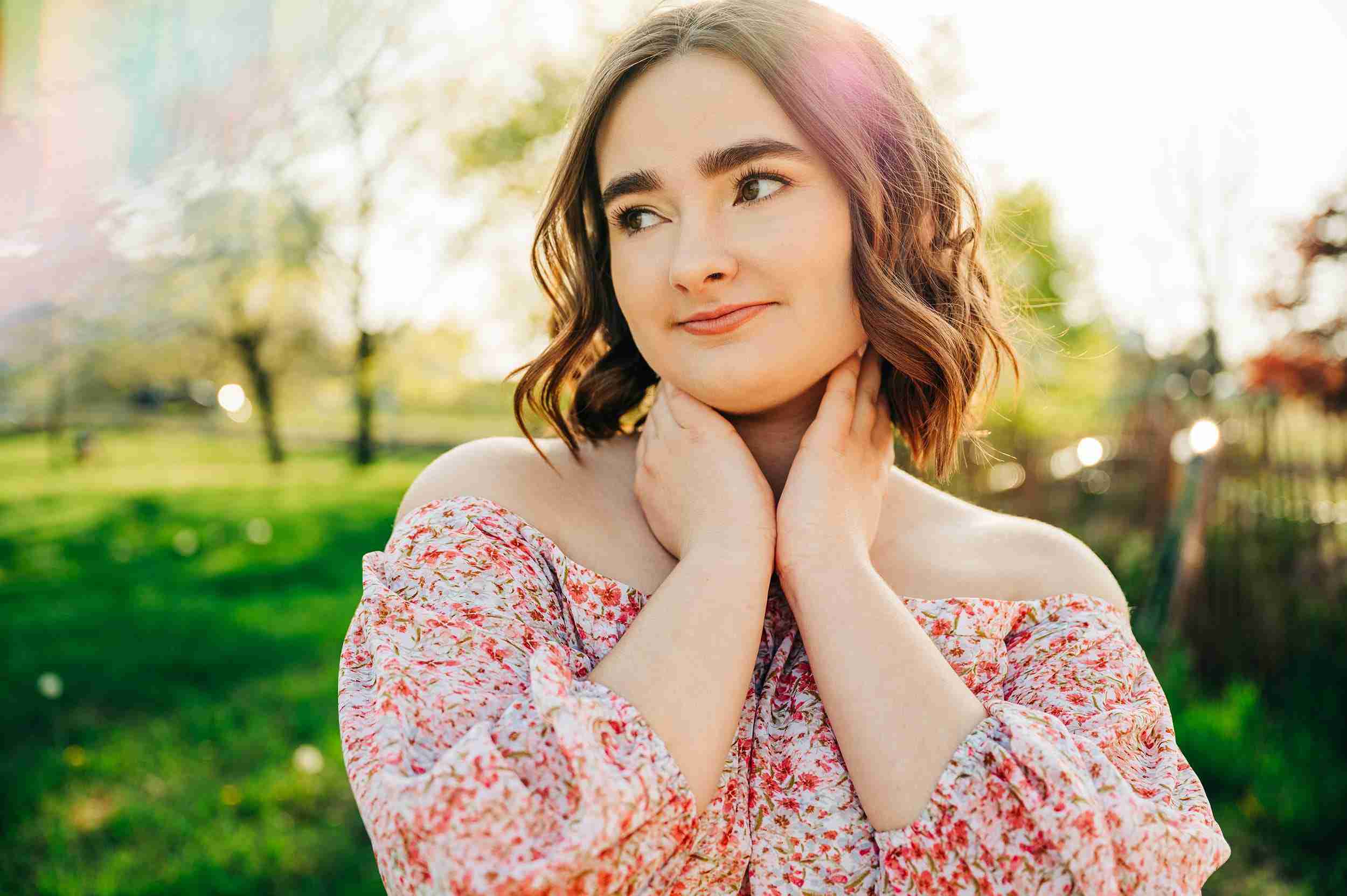 girl pink dress hands holding neck